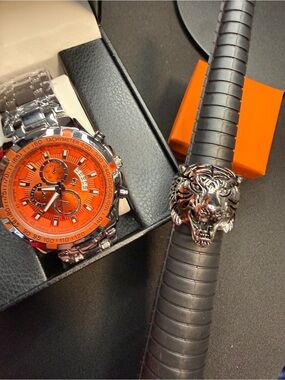 Bold Orange Dial Chronograph Watch with Stainless Steel Tiger Ring